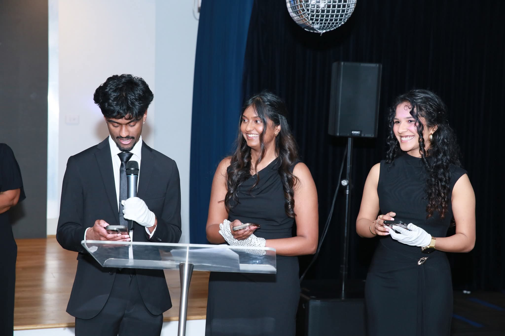 Young Hosts at the Podium