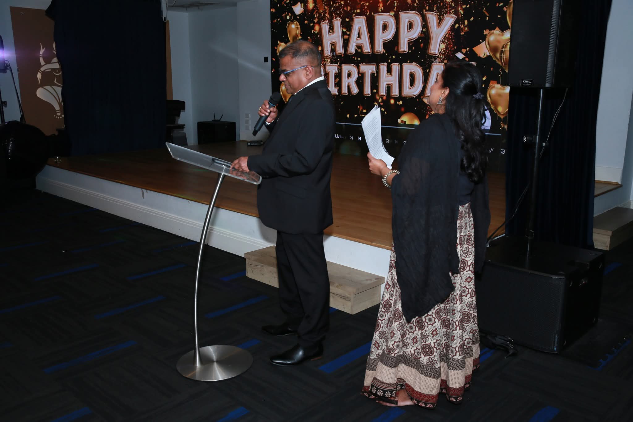 Program Hosts on Stage