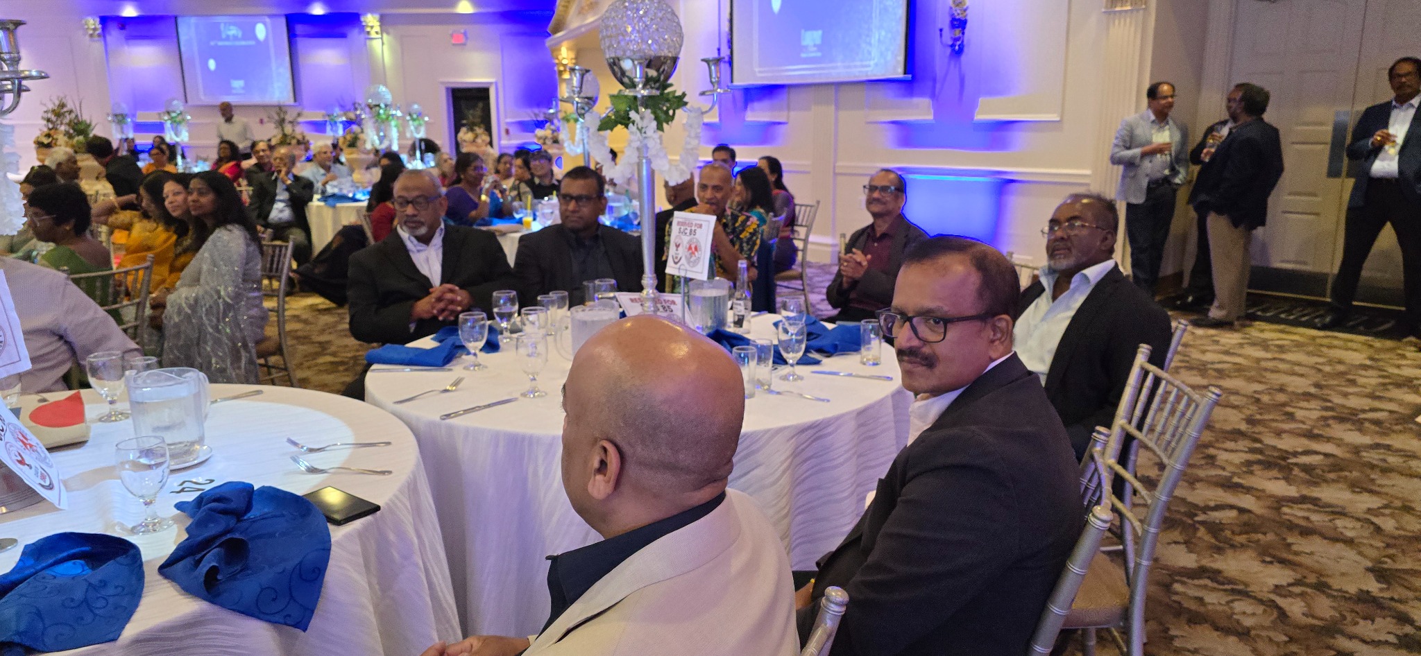 Friends Around the Celebration Tables