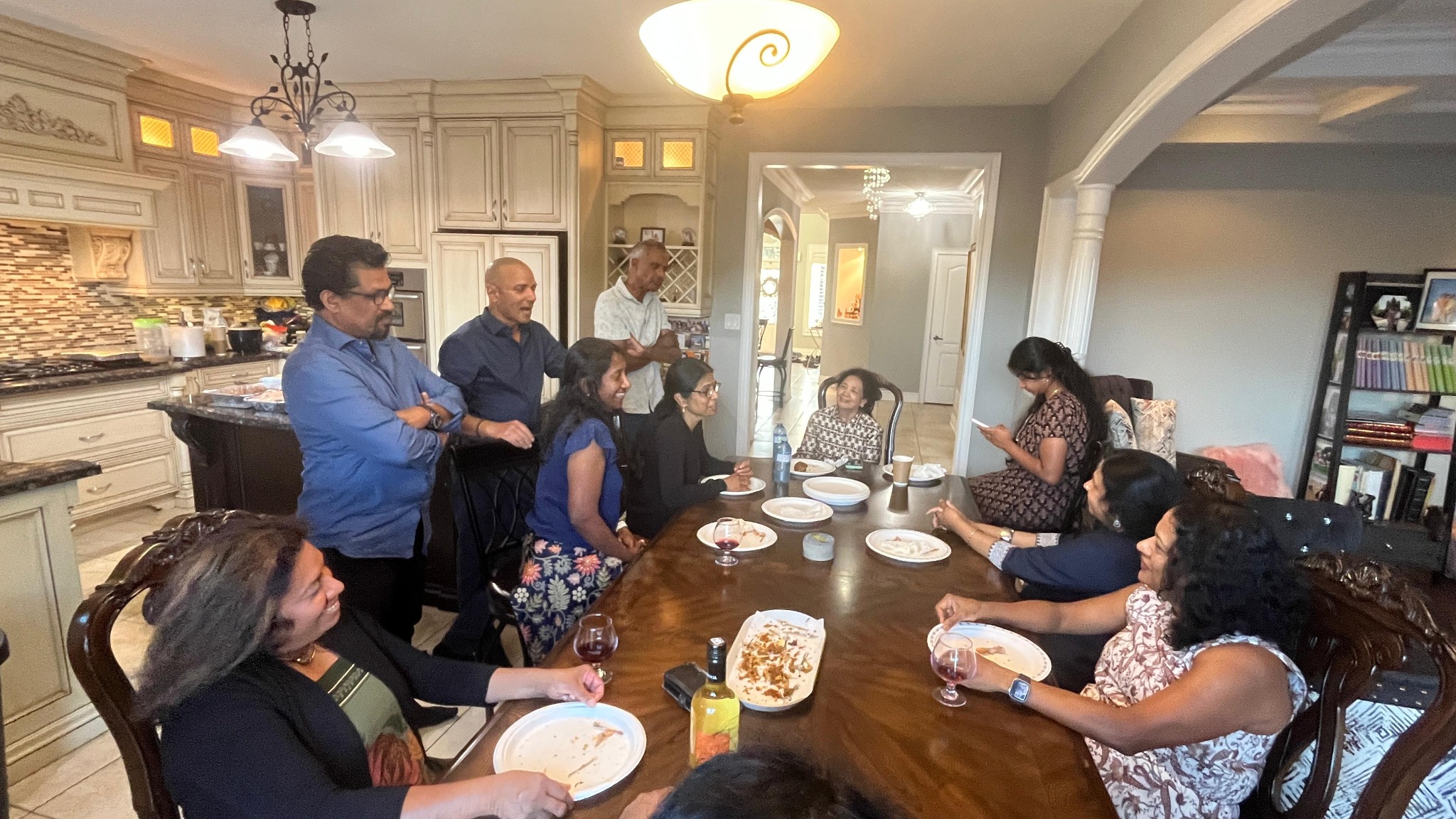 Friends gathering in dining room