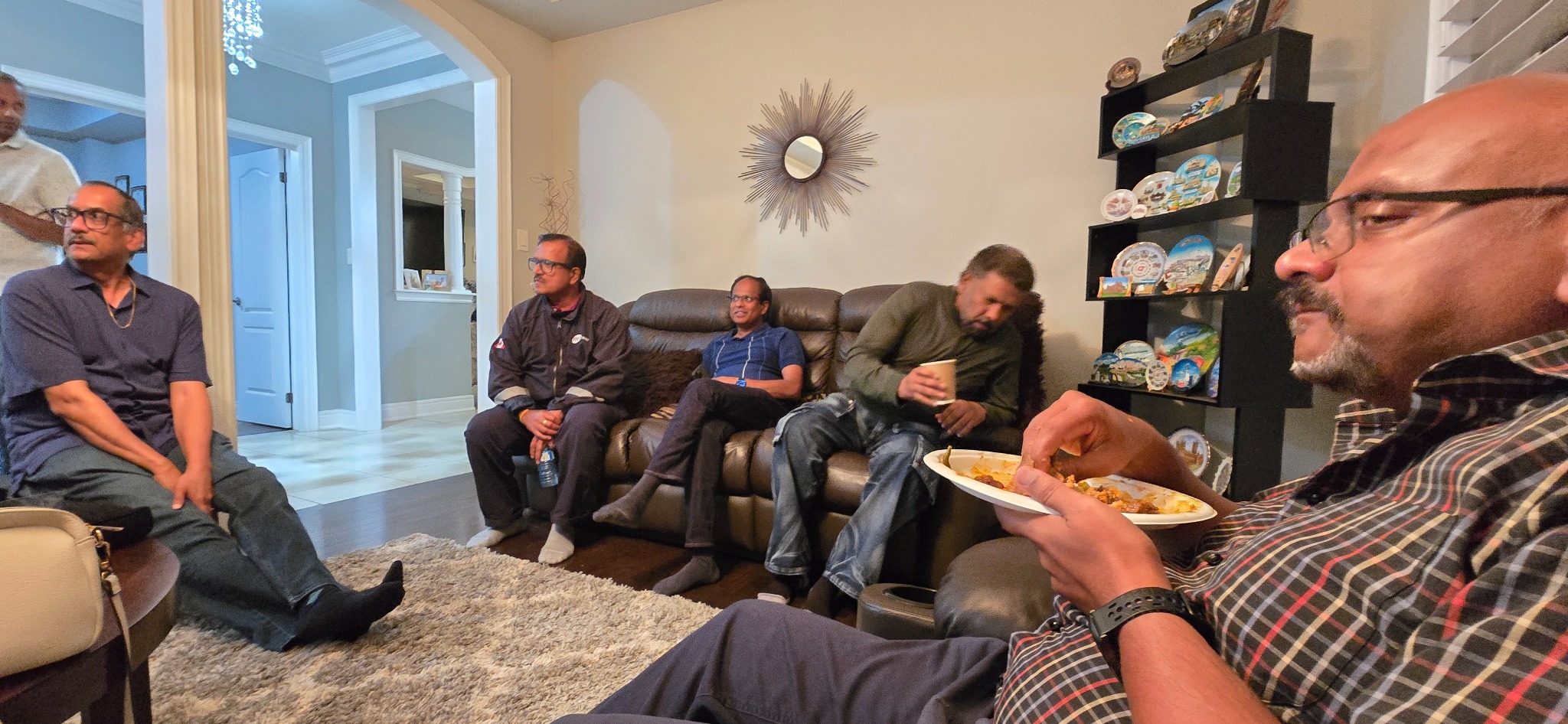 Friends relaxing in the living room