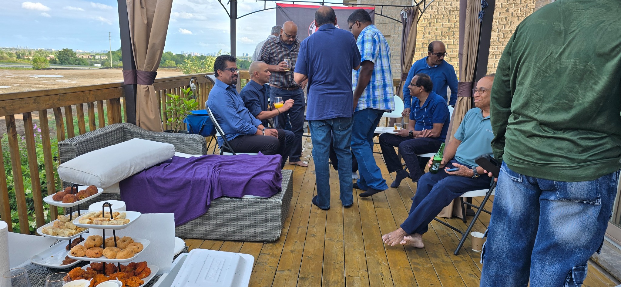 Outdoor gathering with snacks and friends